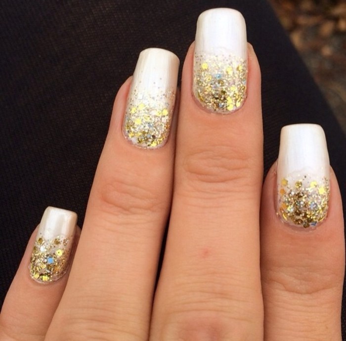 Gold sparkle nail polish